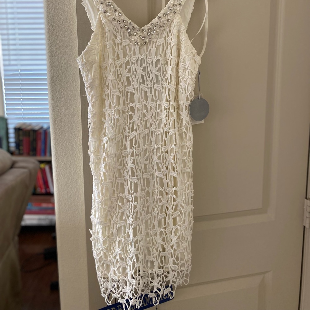 Beautiful white dress lace like overlay with diamond style stones- 4 prom